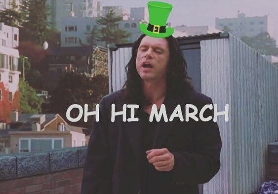 Still image from the film the Room starring Tommy Wiseau.

It's the scene where he walks in and say "Oh Hi Mark" but the image has been edited to say "Oh Hi March" and someone put a cartoon St. Patricks Day hat on Tommy.

Now that I explained the joke, it's less funny. Happy MARCH!